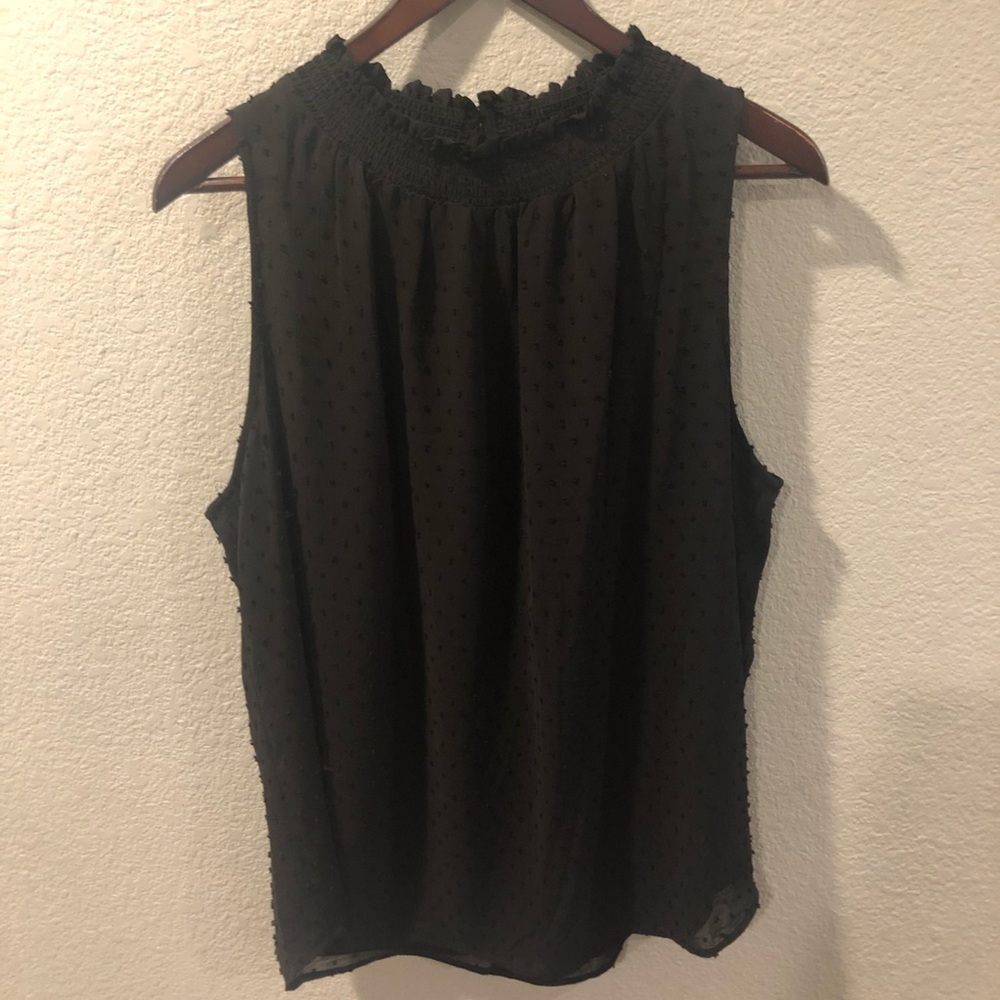 Black polka dot top with slit in the back